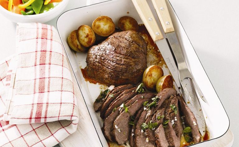 Roast lamb rump with tomato, red onion and oregano. Roast lamb rump with tomato, red onion and oregano.